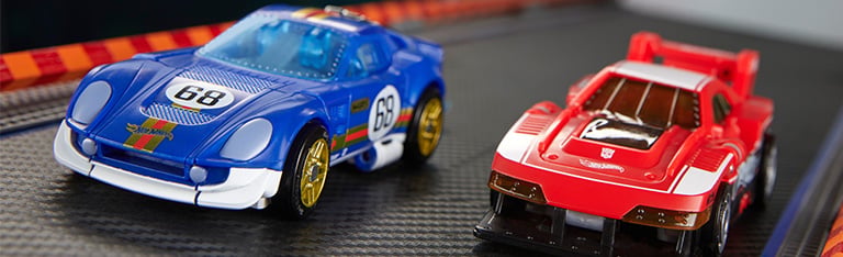 Image of Hot Wheels x Transformers Deluxe Class GT-Scorcher & El Segundo Coupe