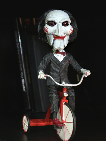 Saw Puppet on Tricycle Head Knocker Gallery Image 2