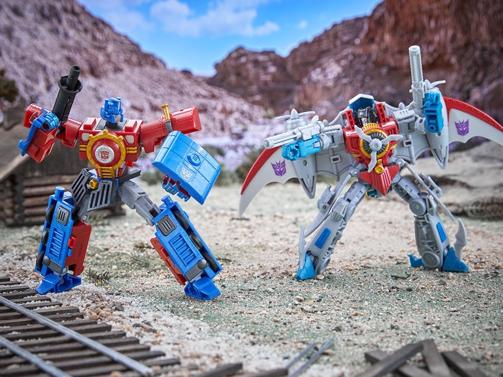 Transformers Timelines Hearts of Steel Optimus Prime and Starscream Action Figure Two-Pack Gallery Image 1